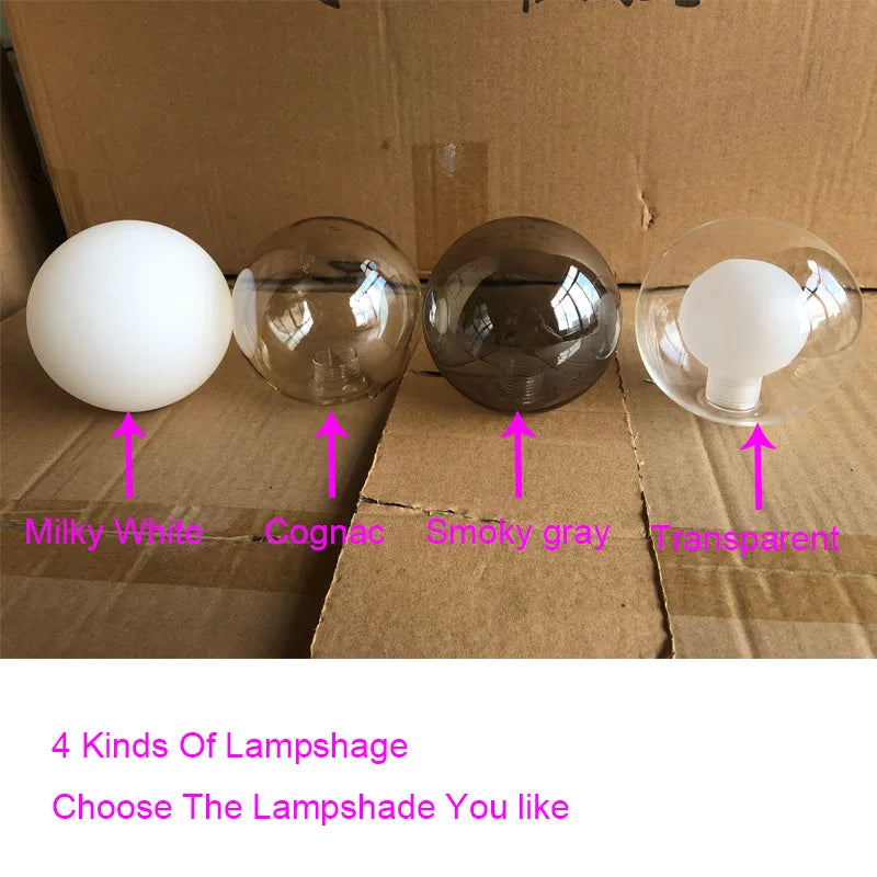  "Nordic modern LED pendant light available in gold and black finishes with various glass globe colors."