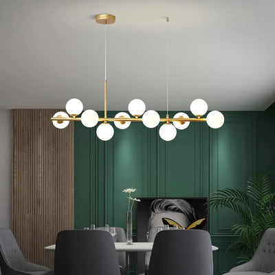 : "Elegant living room featuring the Nordic modern LED pendant light with 11 glass globes."