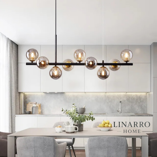  "Nordic modern LED pendant light with 11 glass globes and gold finish, suspended over a dining table."