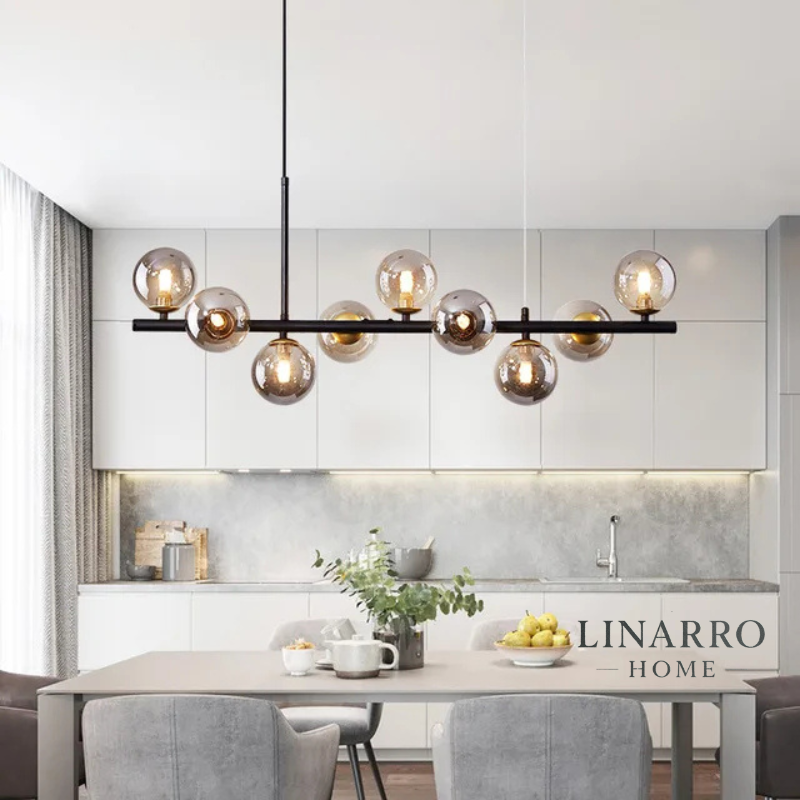  "Nordic modern LED pendant light with 11 glass globes and gold finish, suspended over a dining table."